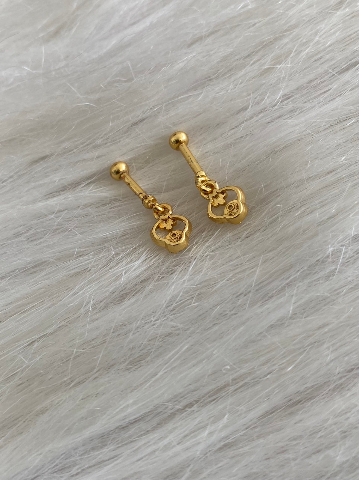 Gold tone cz white stone bugadi screw earrings dj-55126