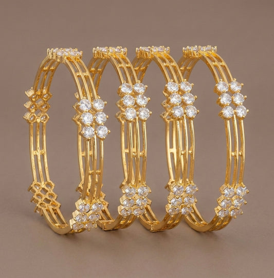 Gold Tone Cz White Set Of 4 Bangles (2.8) DJ27634