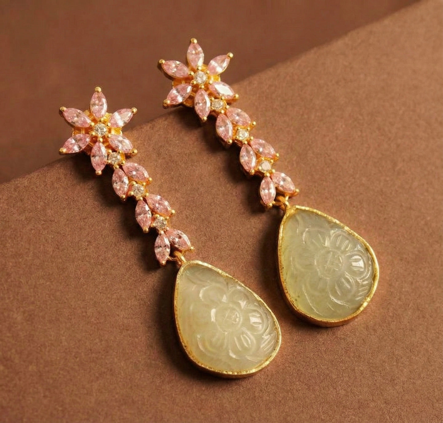 Gold tone baby pink-cream carved stone earrings-dj52593