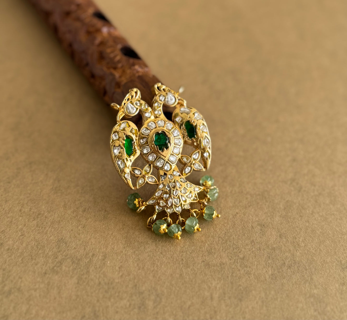 Gold tone pink-green-white kundan jadau reversible Gandaberunda pendant dj-51588