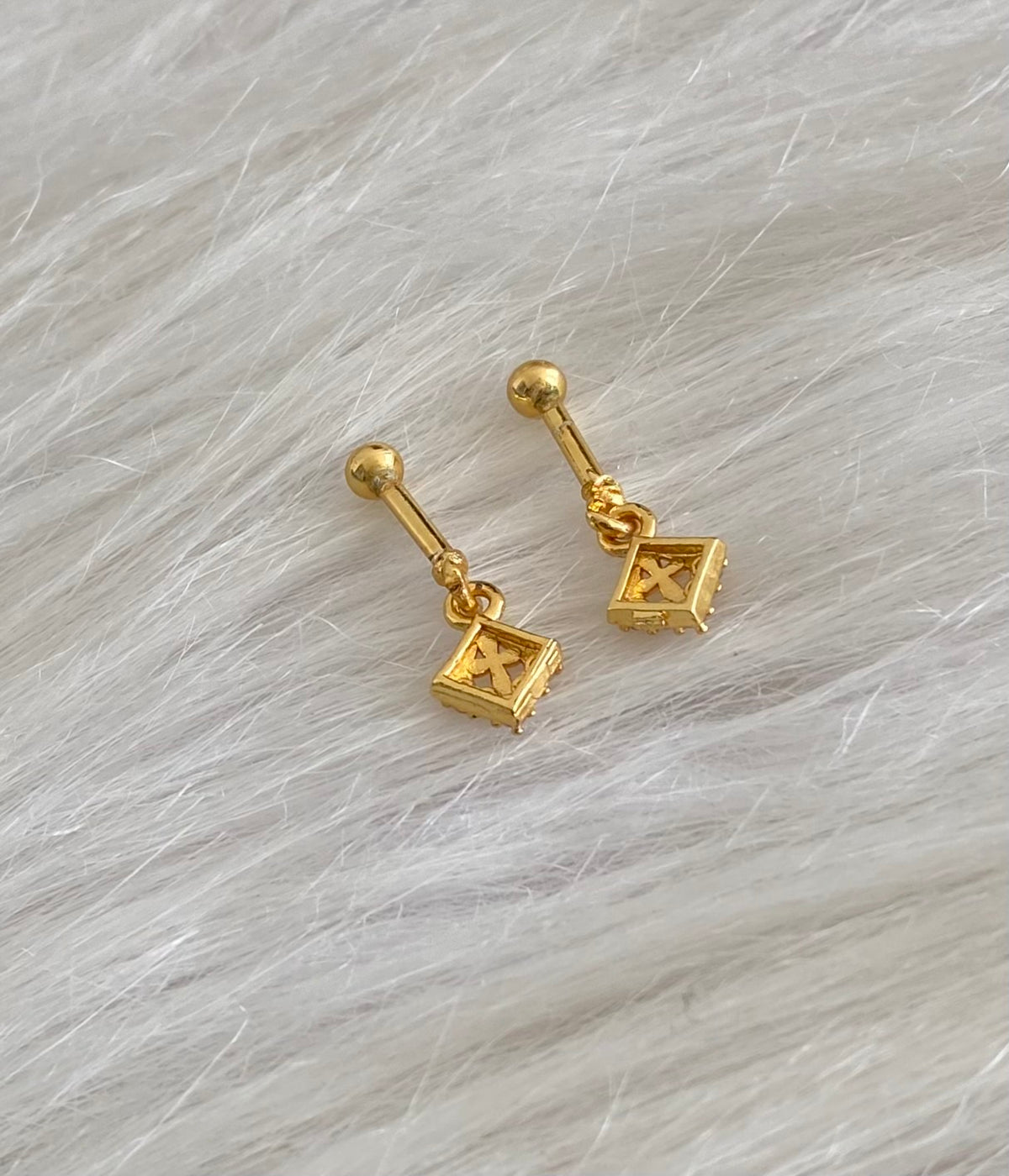 Gold tone cz white stone bugadi screw earrings dj-55124