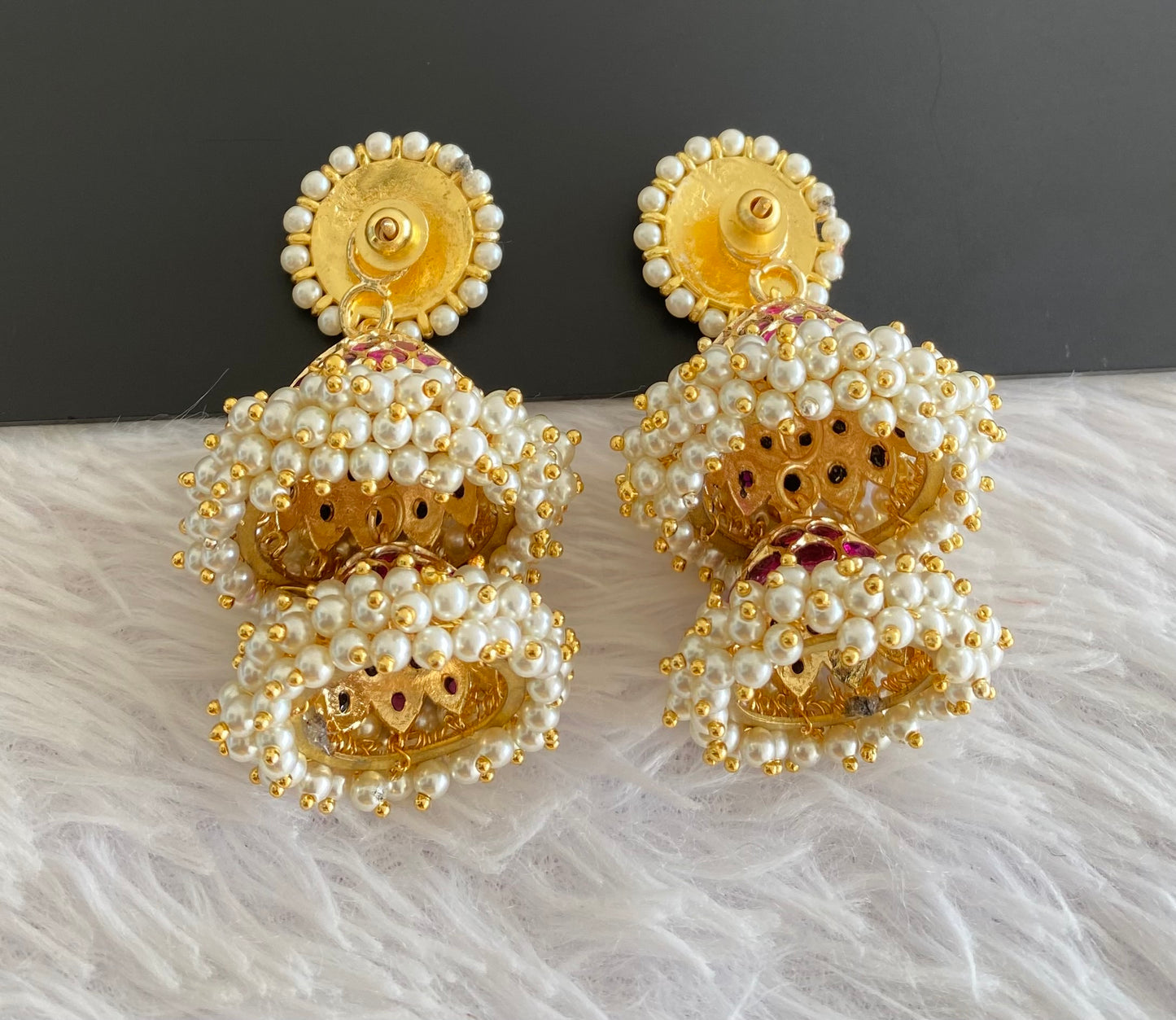 Gold tone precious kemp-green stone pearl big step jhumkka dj-53214