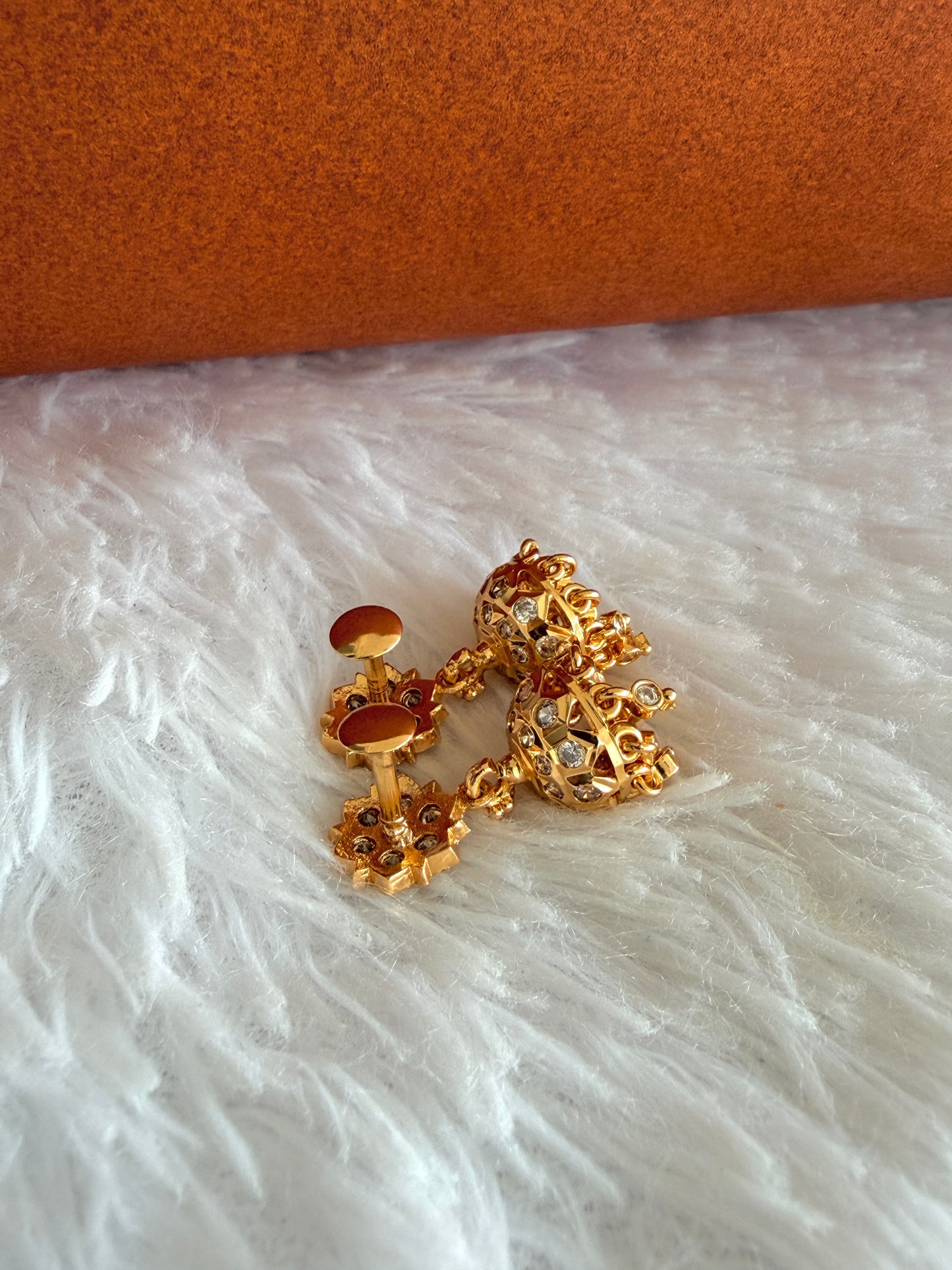 Gold tone AD white south Indian flower jhumkka dj-53271