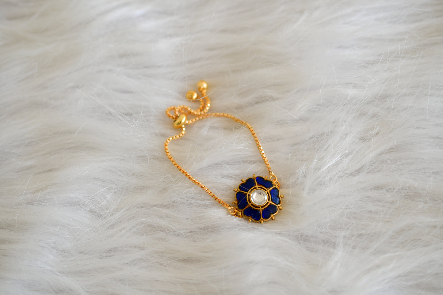 Gold tone blue kundan jadau flower bracelet dj-52662