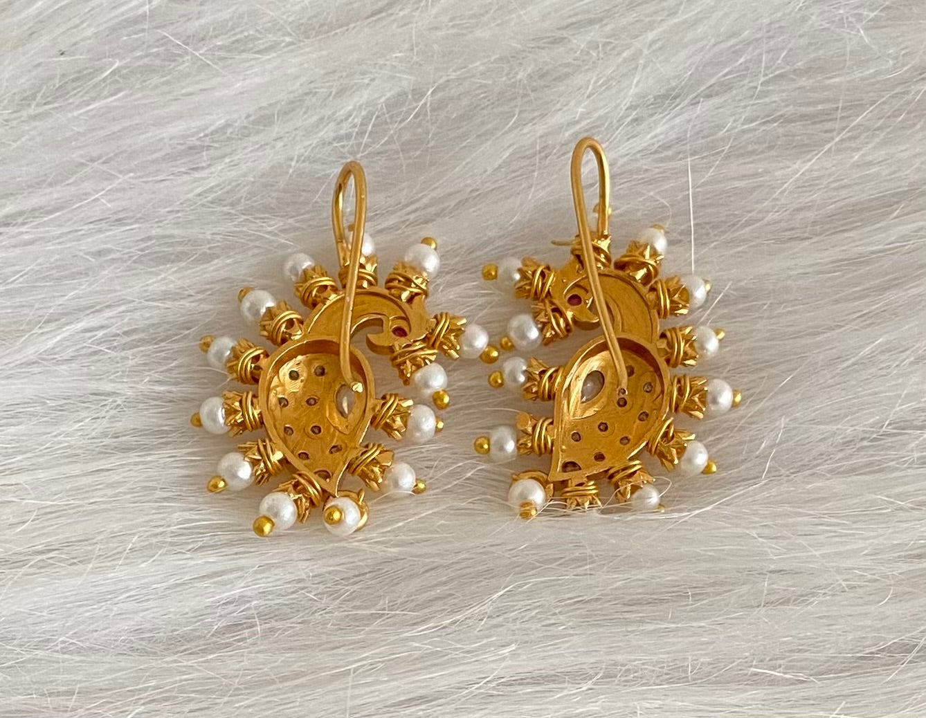 Matte gold white stone pearl peacock bugadi earrings dj-53674