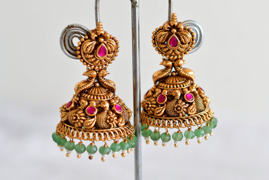 Antique gold tone pink green beaded swan jhumkka dj-52504