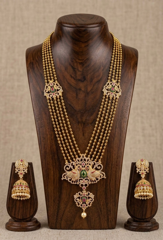 Gold tone cz ruby-green multilayer peacock haar set-dj11499
