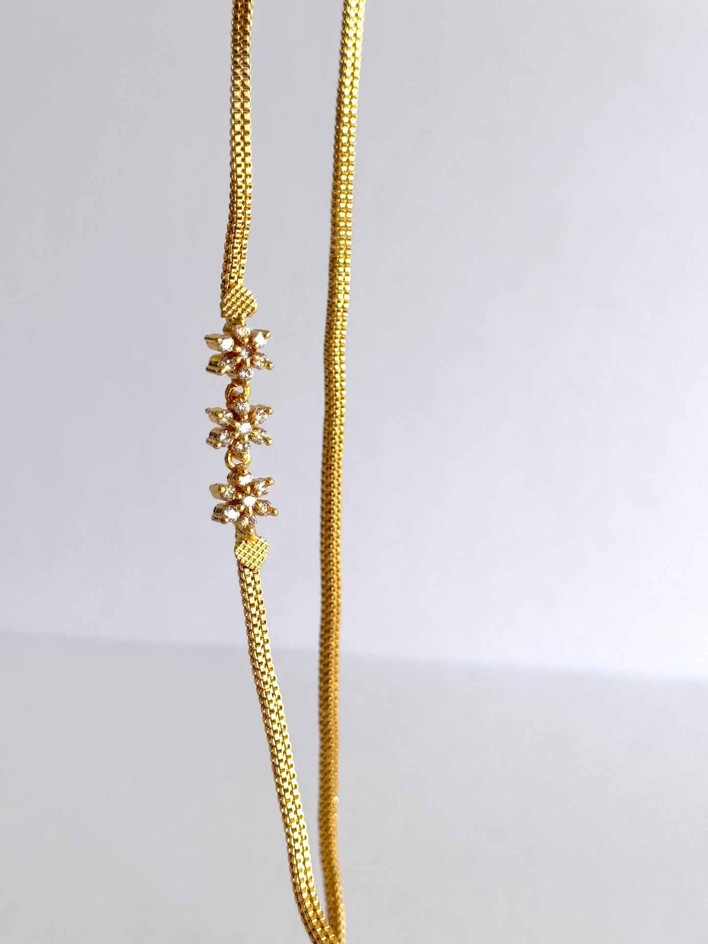 Gold tone cz white Nakshatra mugappu 24 inches chain dj-42823