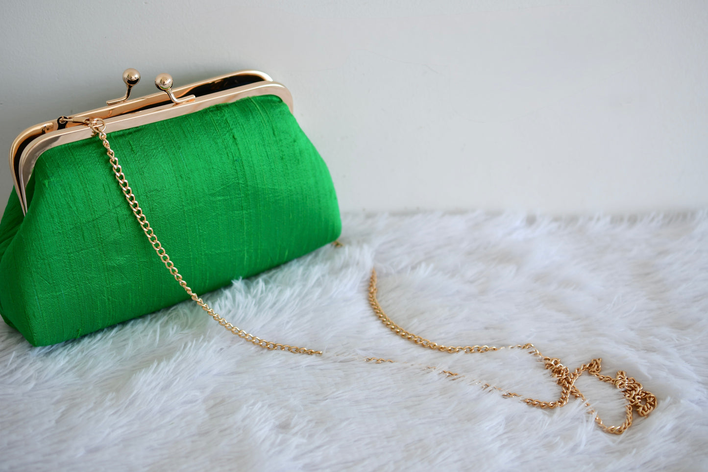 Tanjore painted green silk clutch dj-52654