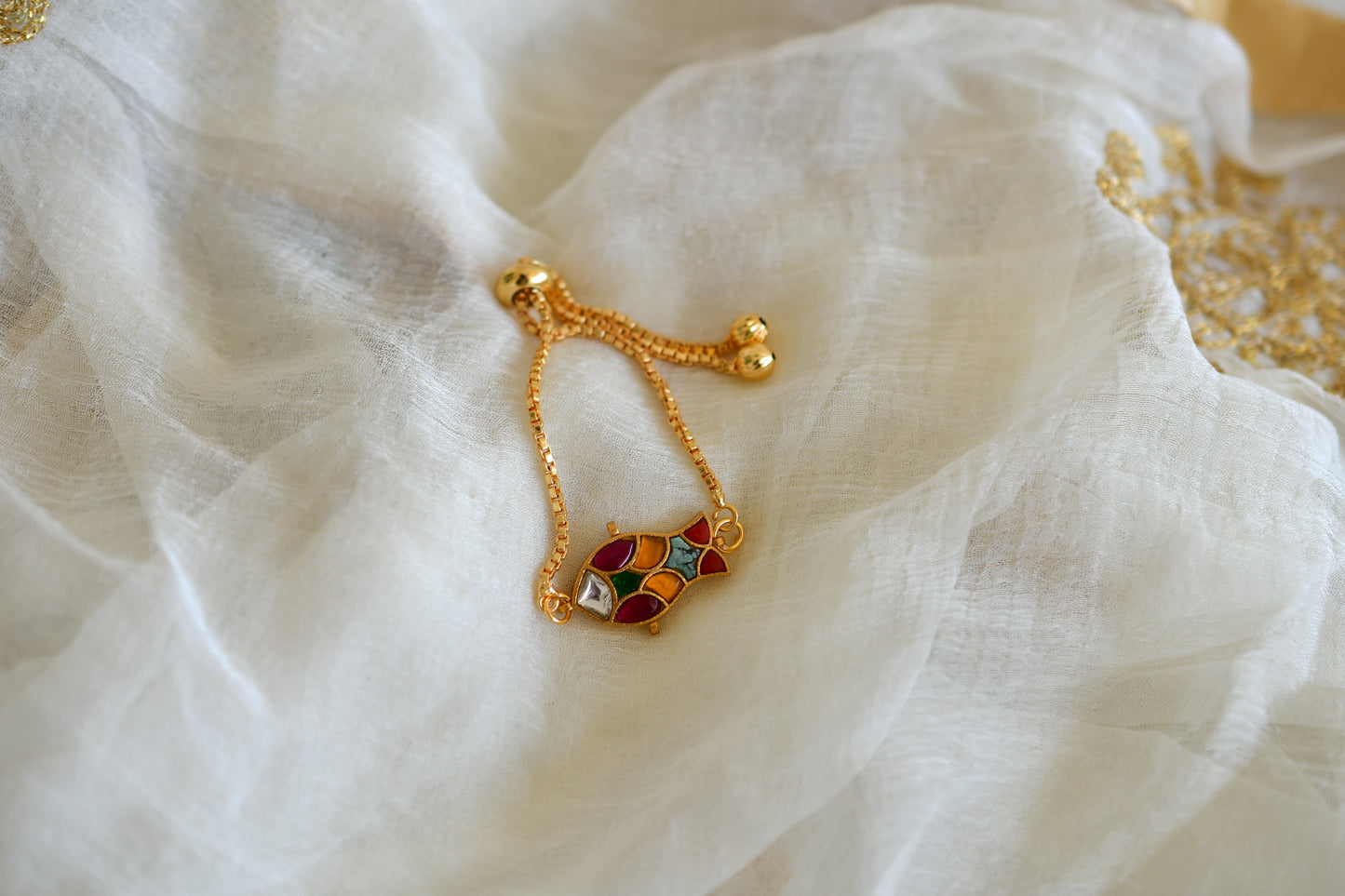 Gold tone multicolor kundan jadau fish bracelet dj-52672