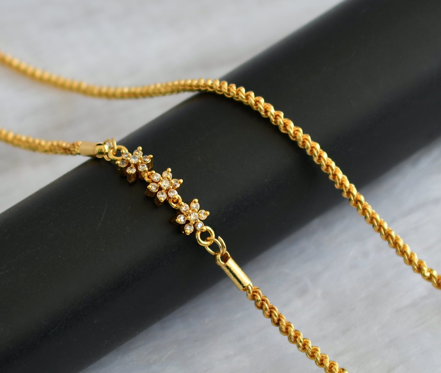 Flower Mugappu Designs For Thali Chains Gold Tone White Stone