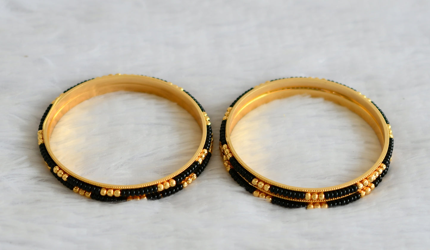 Gold tone karimani set of 4 bangles(2.6) dj-50970