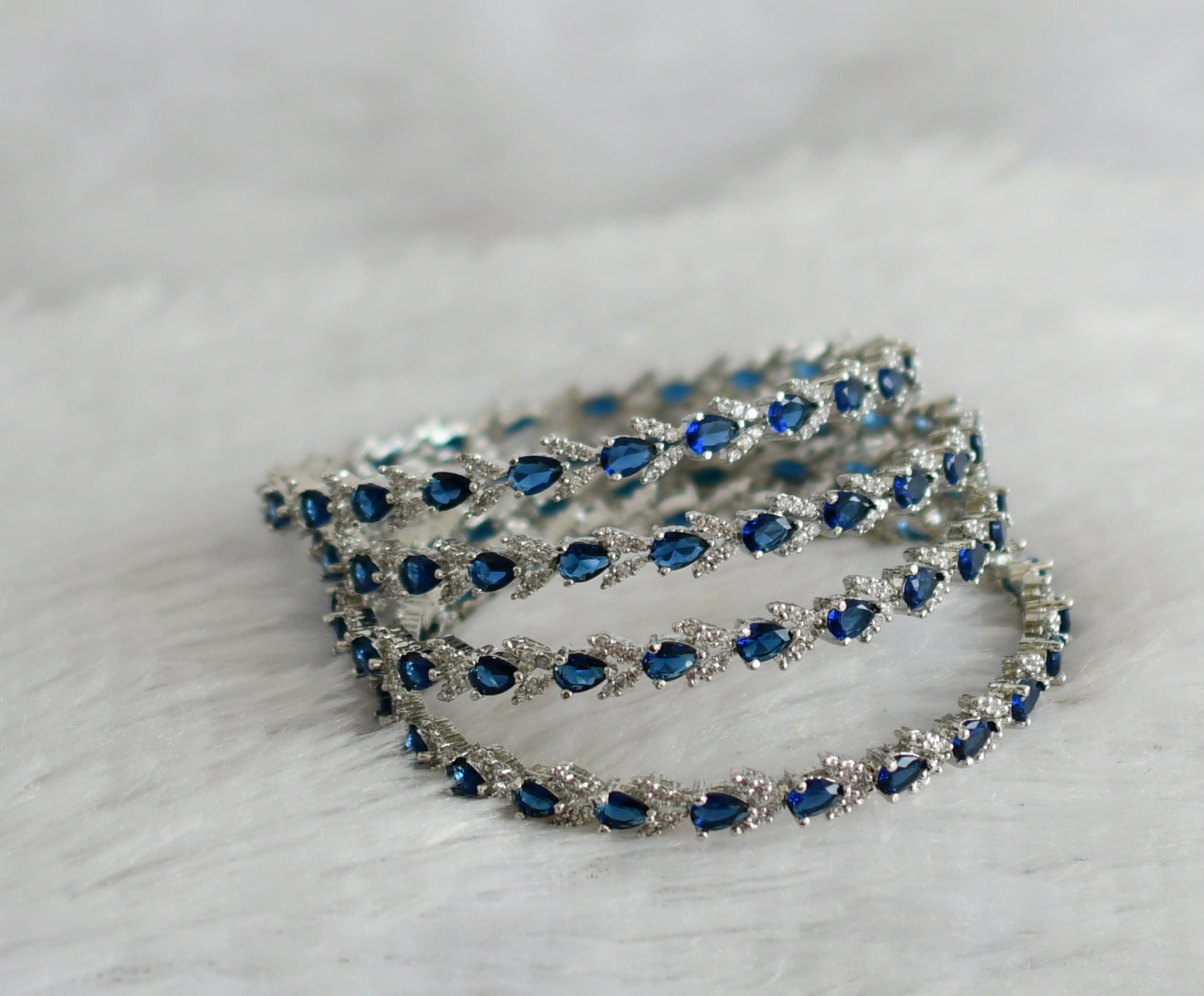 Silver tone cz blue-white thilak stone set of 4 bangles(2.4) dj-47714