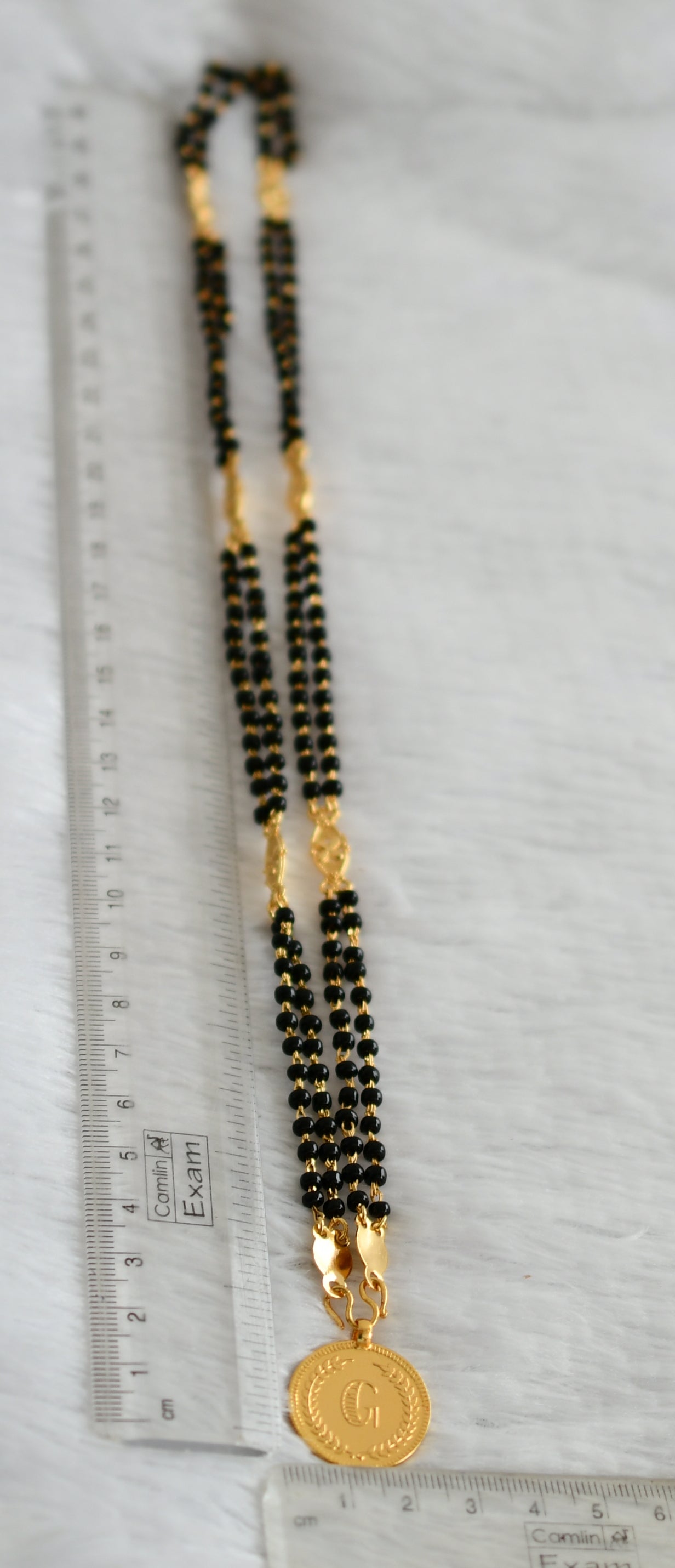 Gold tone 24 inches black karimani double layer chain with guruvayurappan coin pendant dj-46221