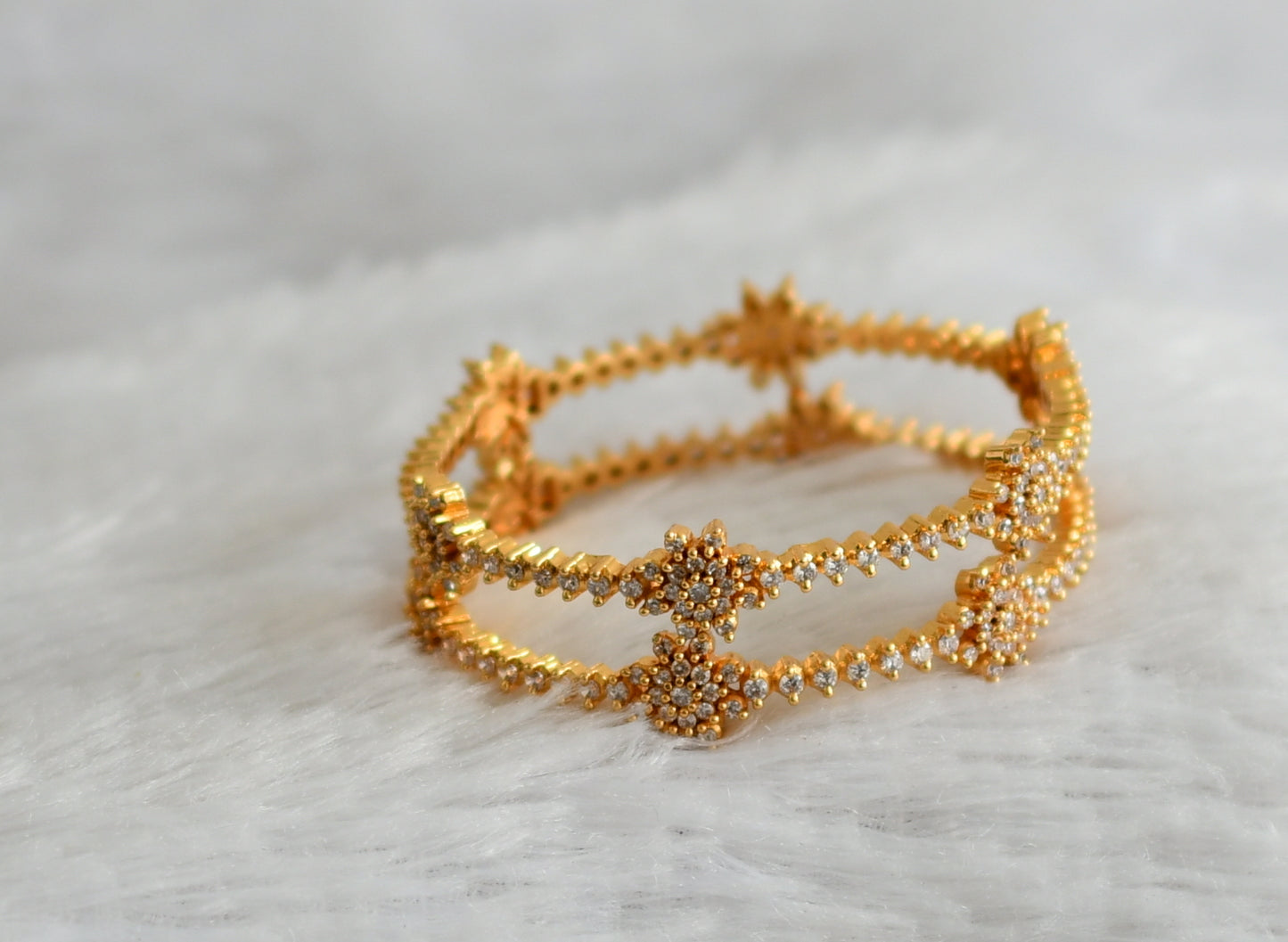Gold tone cz white stone flower bangles(2.4) dj-47720