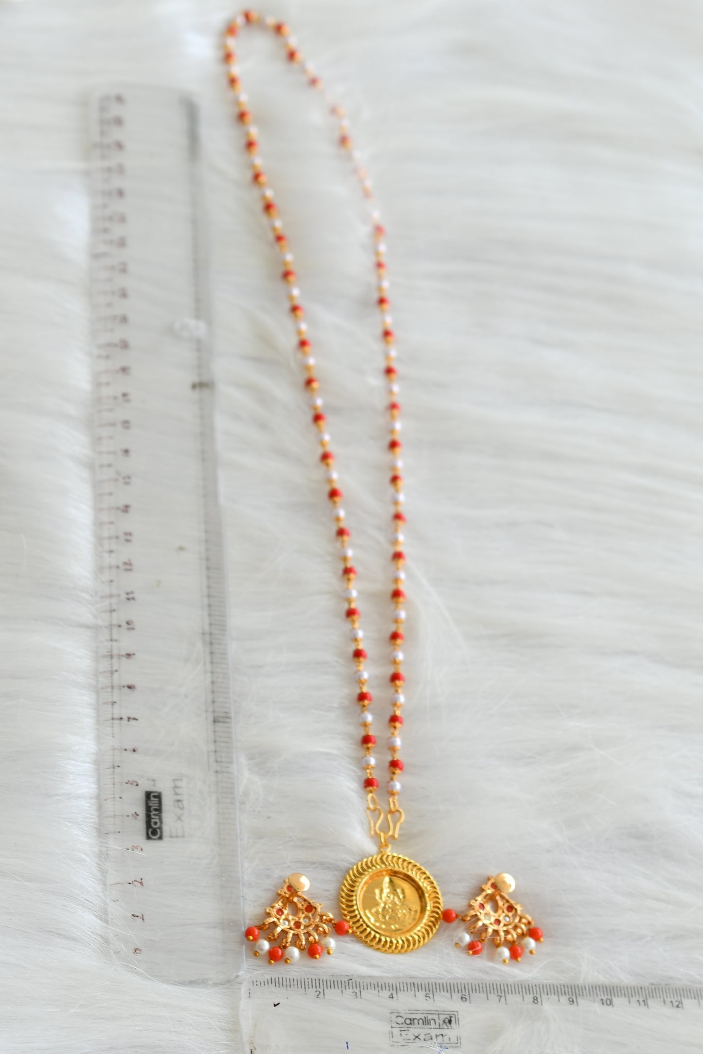 Gold tone pearl-coral chain with Lakshmi pendant and earrings dj-43006