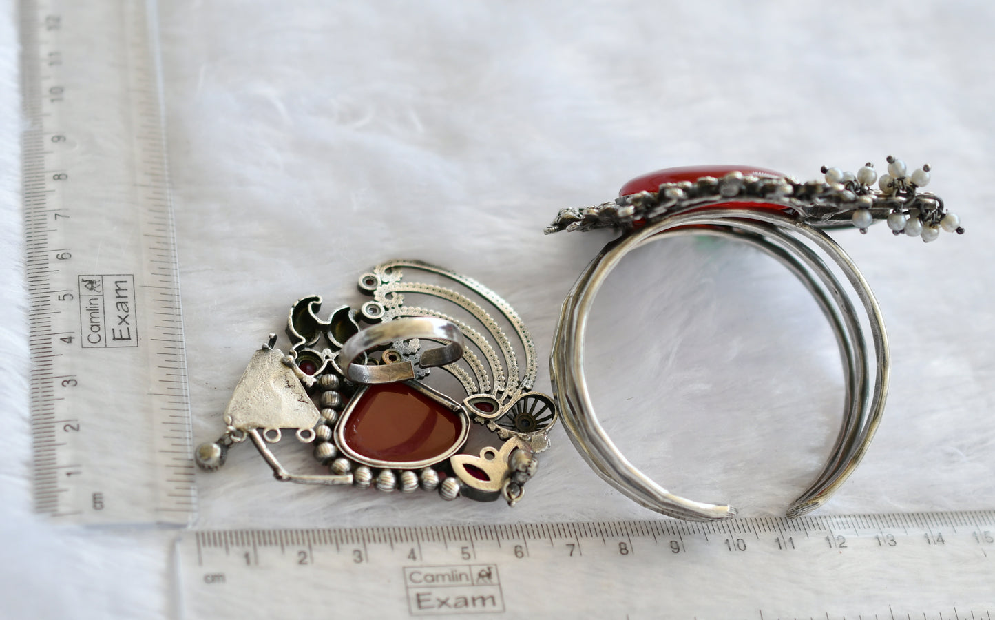 Silver tone red stone big bracelet with adjustable finger ring dj-46430