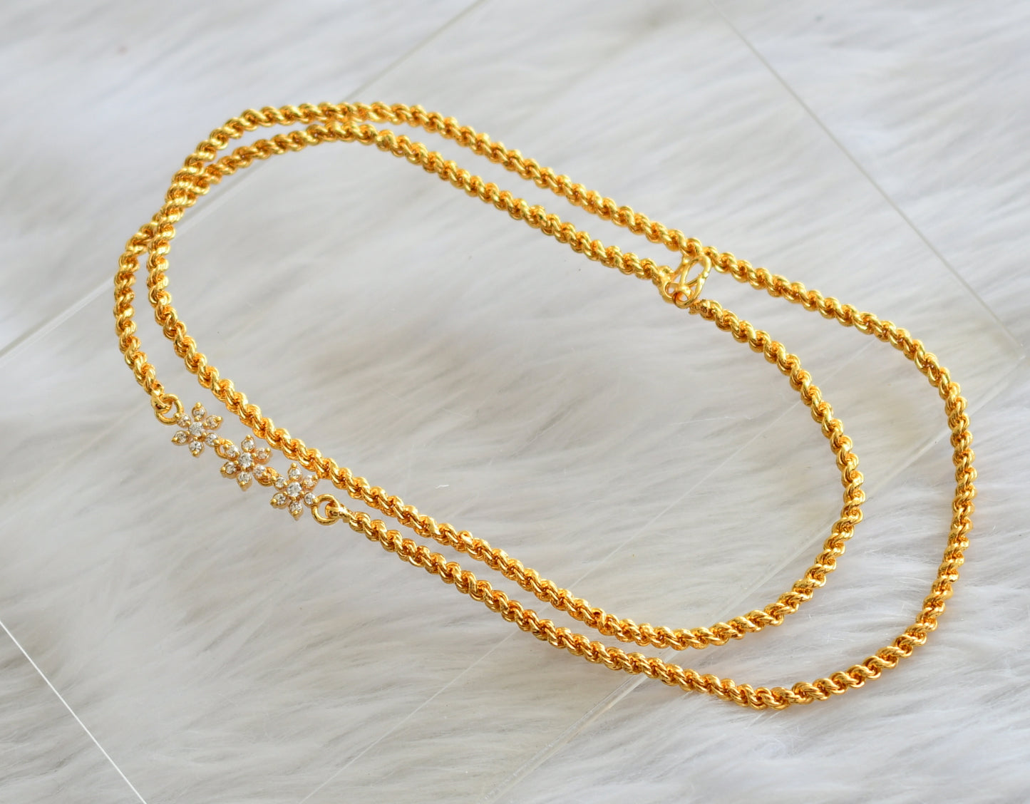Gold tone rope chain cz white stone flower mugappu dj-44636