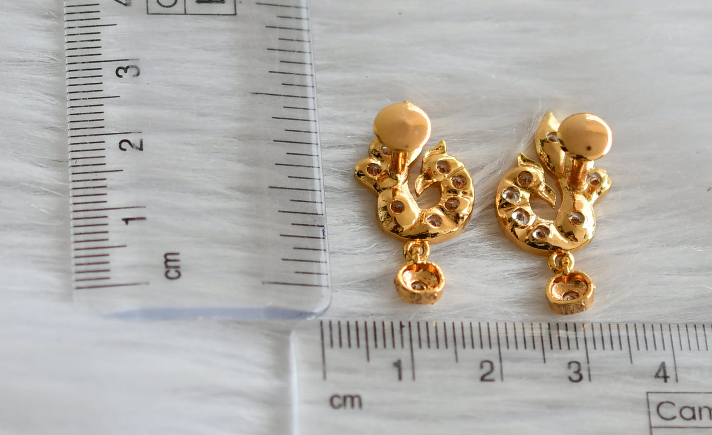 Gold tone ad white stone peacock earrings dj-44907