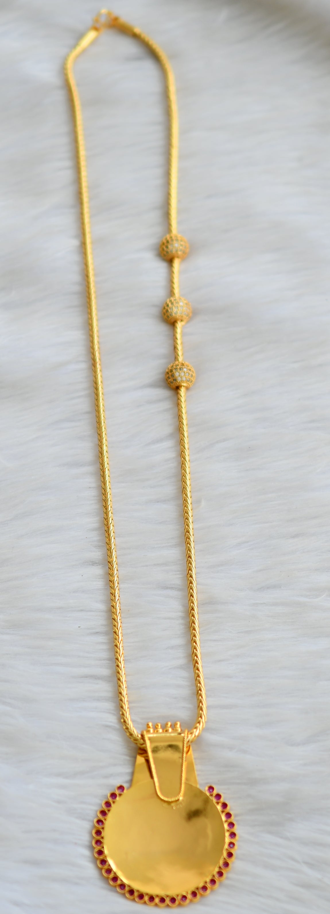 Gold tone ruby stone Kerala style Lakshmi pendant with mugappu chain dj-42077