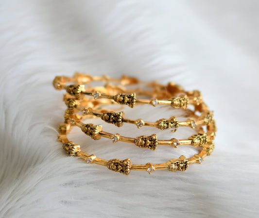 Antique gold tone set of 4 white lakshmi bangles(2.10) dj-51493