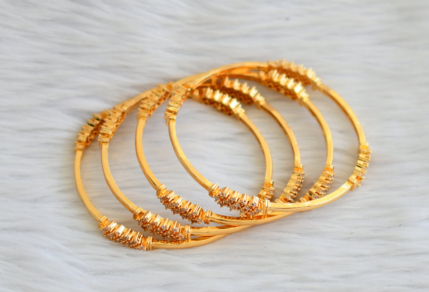 Gold tone cz white set of 4 bangles(2.6) dj-45146