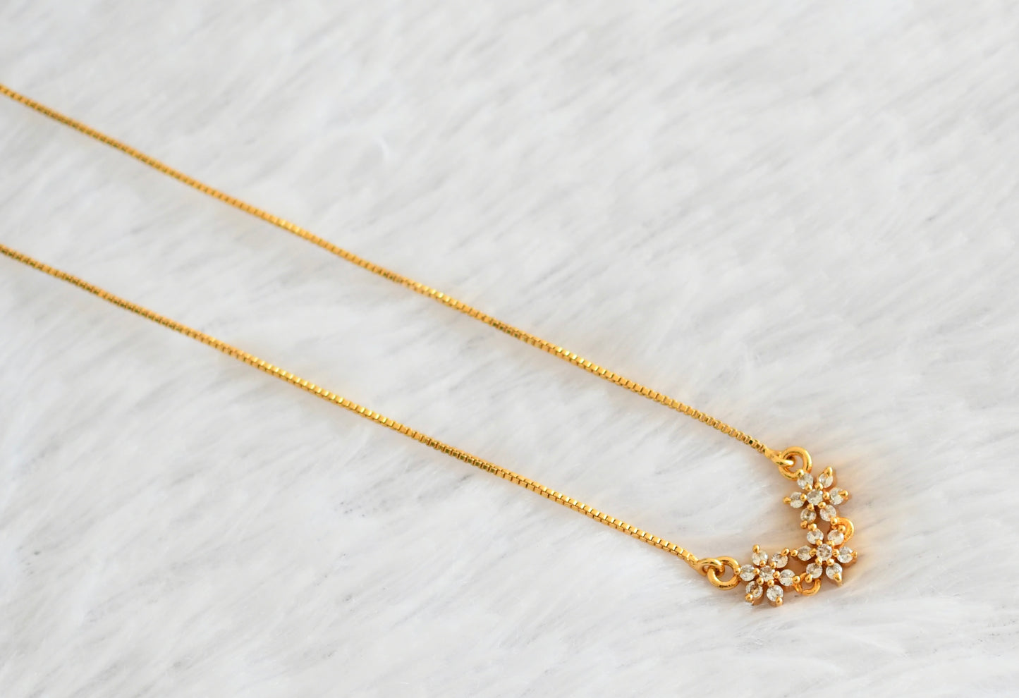 Gold tone white stone flower necklace dj-53101