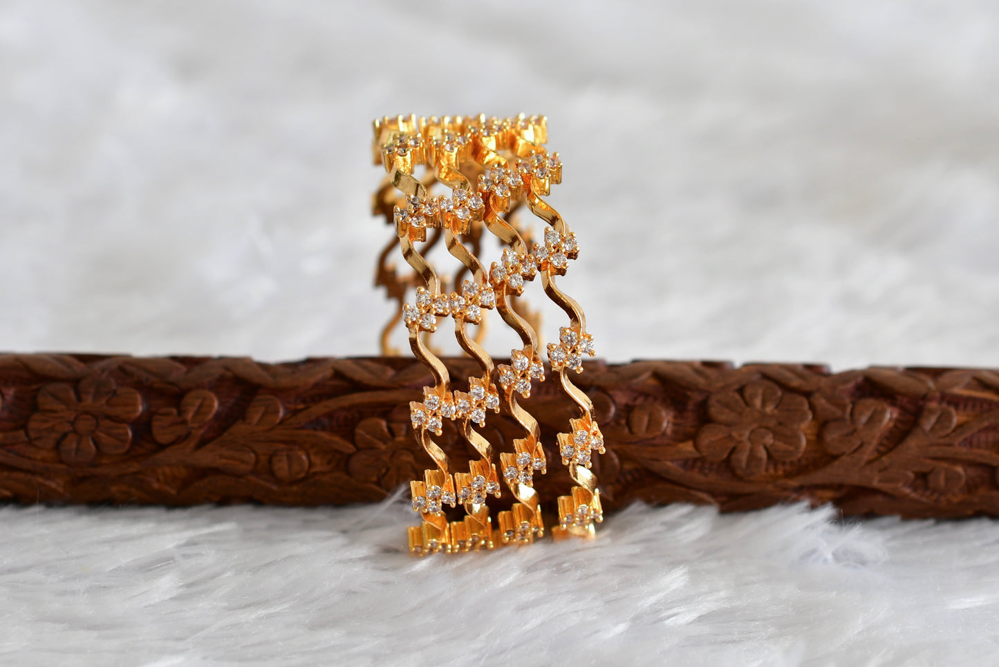 Gold tone cz white set of 4 bangles(2.4) dj-51791