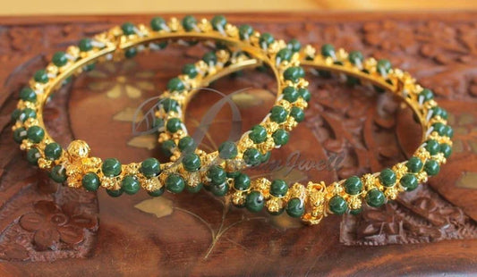 Gold tone green beaded bangles(2.10) dj-48527