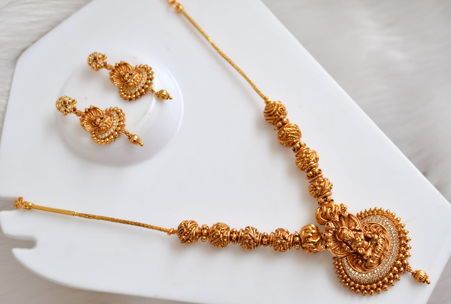 Matte finish beaded white stone Lakshmi necklace set dj-39496