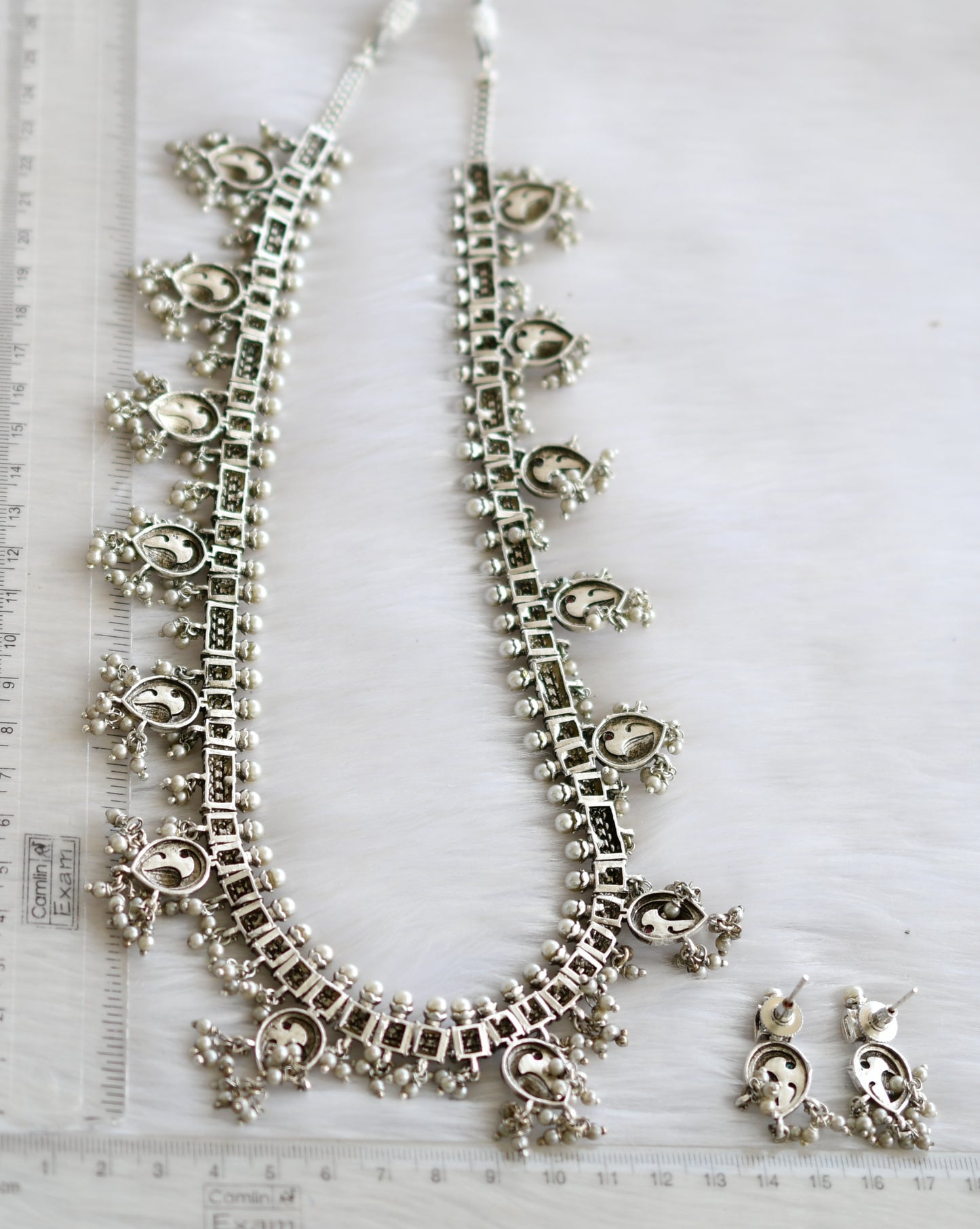 Silver tone ruby-emerald peacock gutta pusalu haar set dj-25080