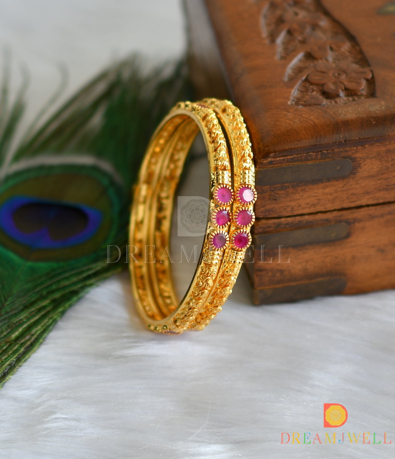 Ruby stone sale bangles design