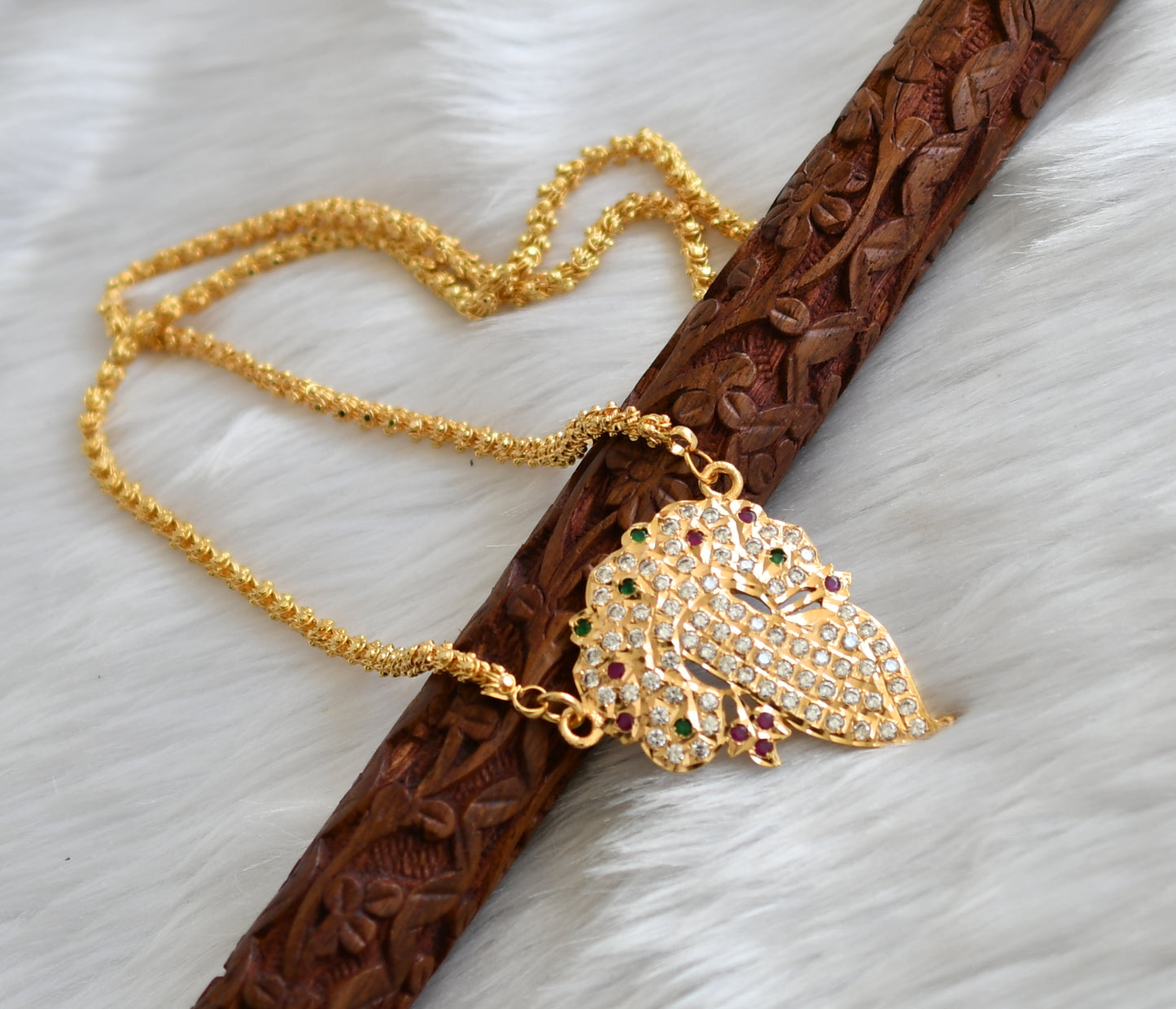 Gold tone ruby-green south Indian style flower pendant with chain dj-28359