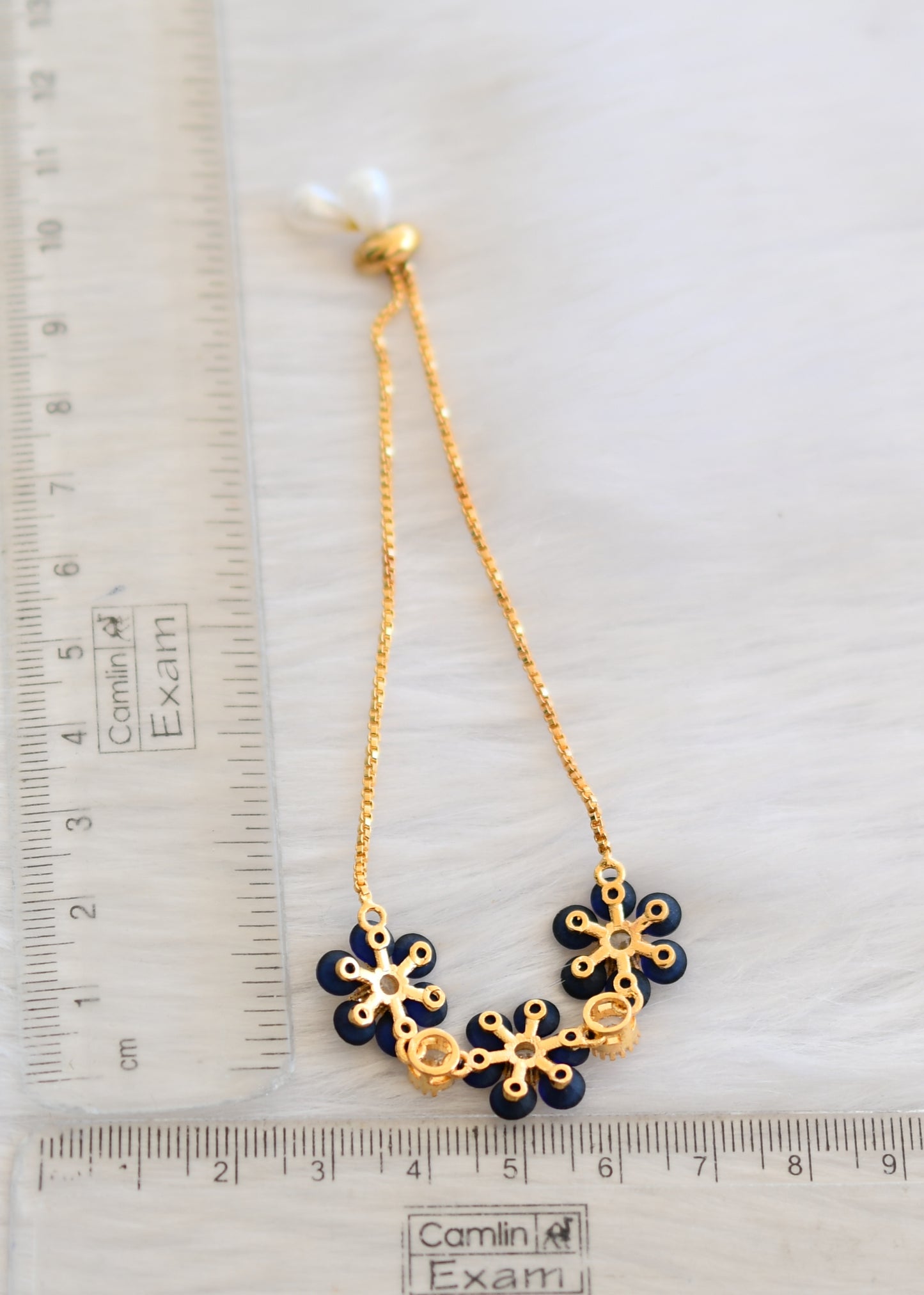 Gold tone cz blue flower adjustable bracelet dj-19347