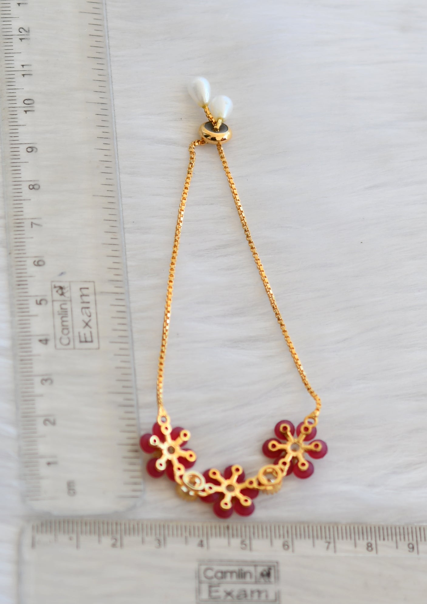 Gold tone cz ruby flower adjustable bracelet dj-19344