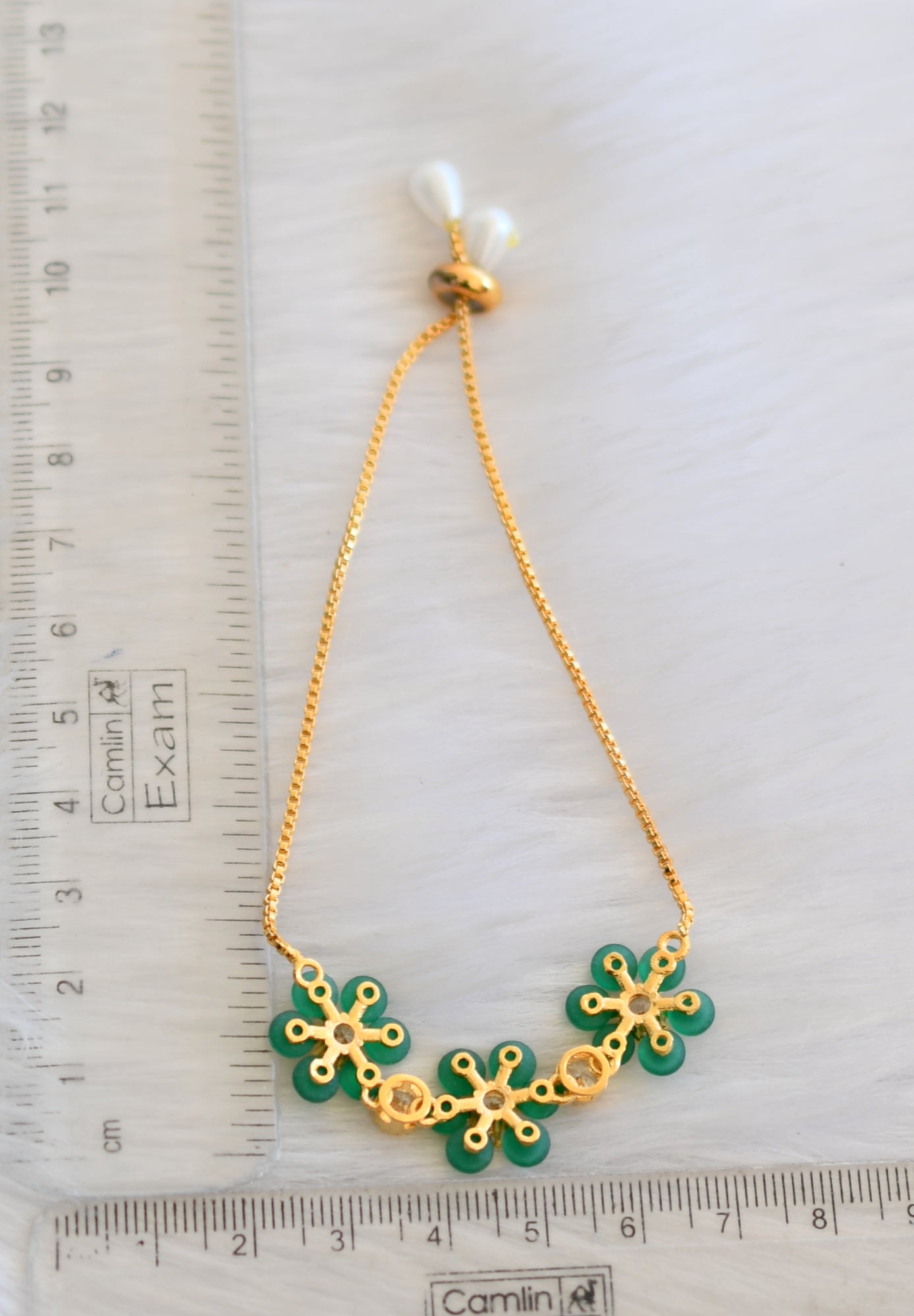 Gold tone cz emerald flower adjustable bracelet dj-19342