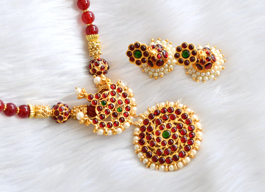 Gold tone kemp-green sun-moon temple necklace set dj-19416