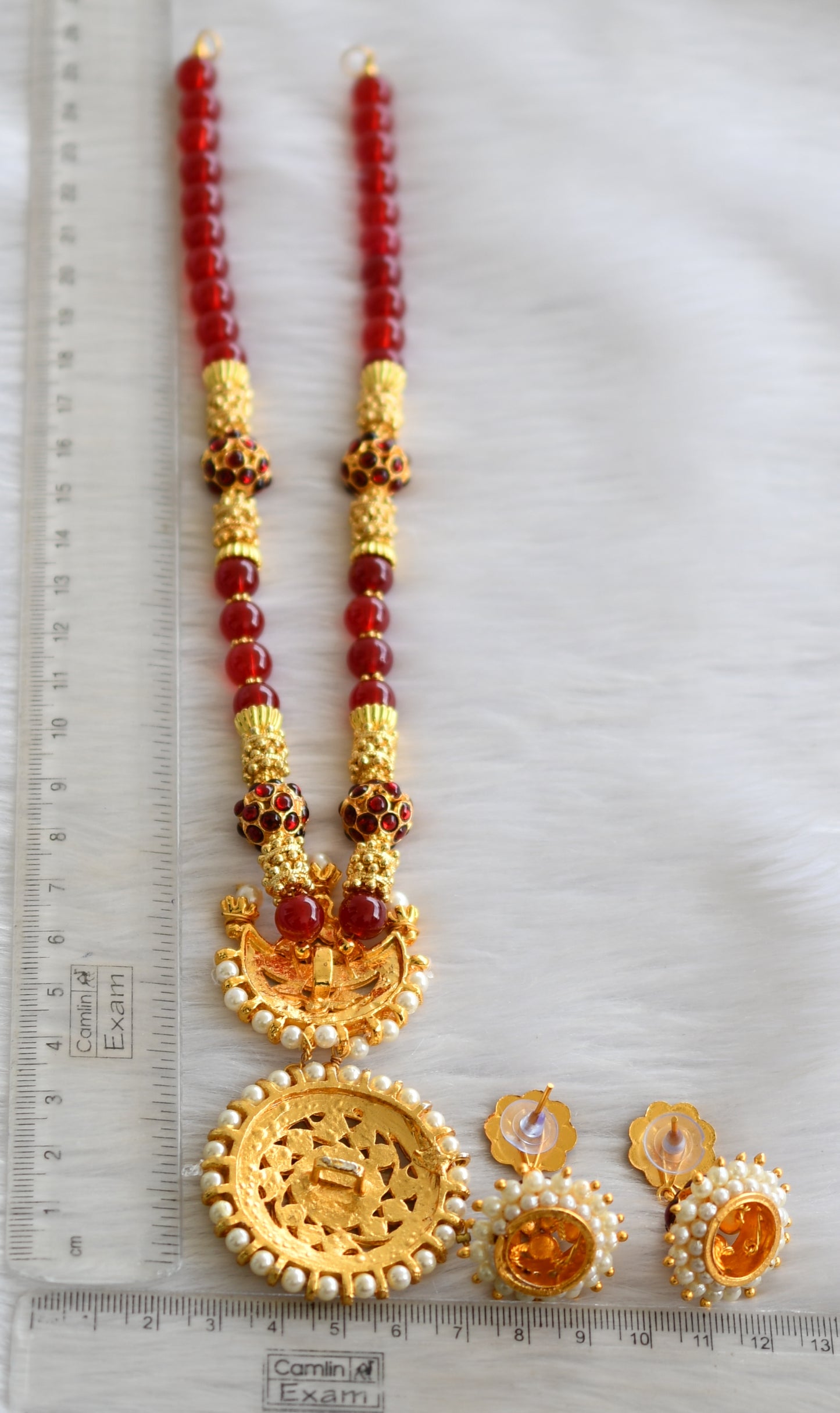 Gold tone kemp-green sun-moon temple necklace set dj-19416