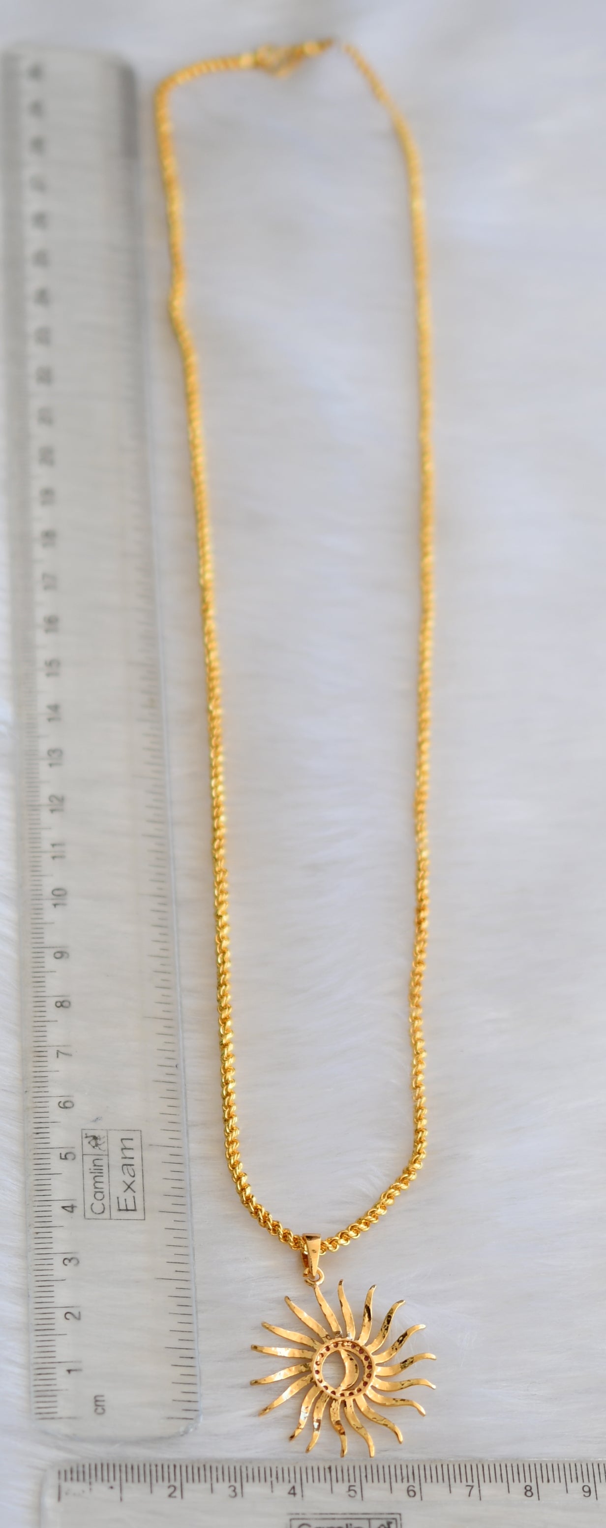 Gold tone cz ruby sun pendant with chain dj-39985