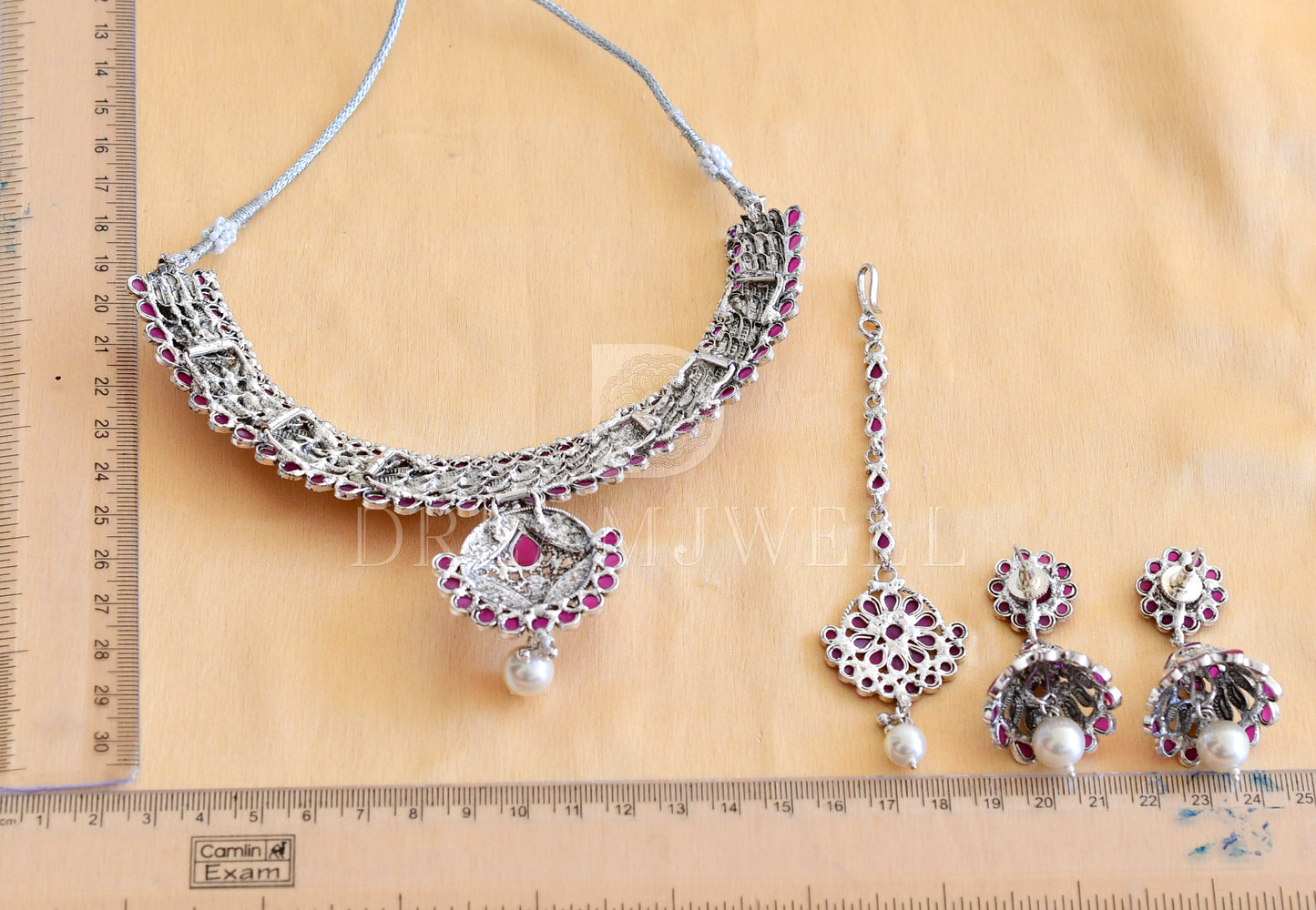 Silver tone ruby designer necklace set with tikka dj-35466