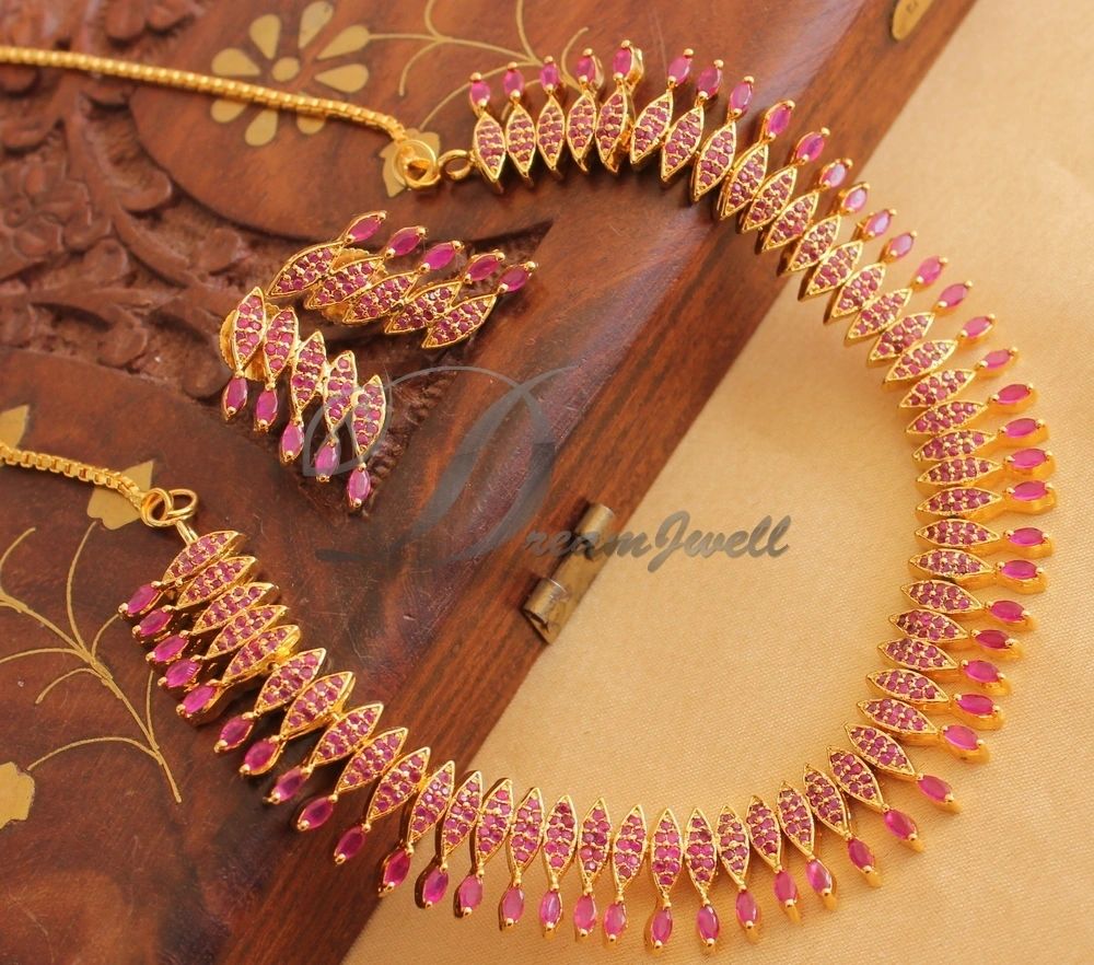 Gold ruby necklace on sale designs