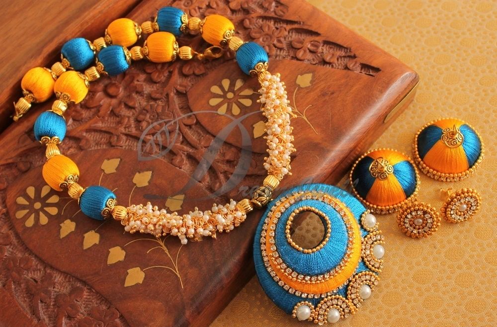 DREAMJWELL Awesome Designer Silk Thread Blue-yellow Necklace Set