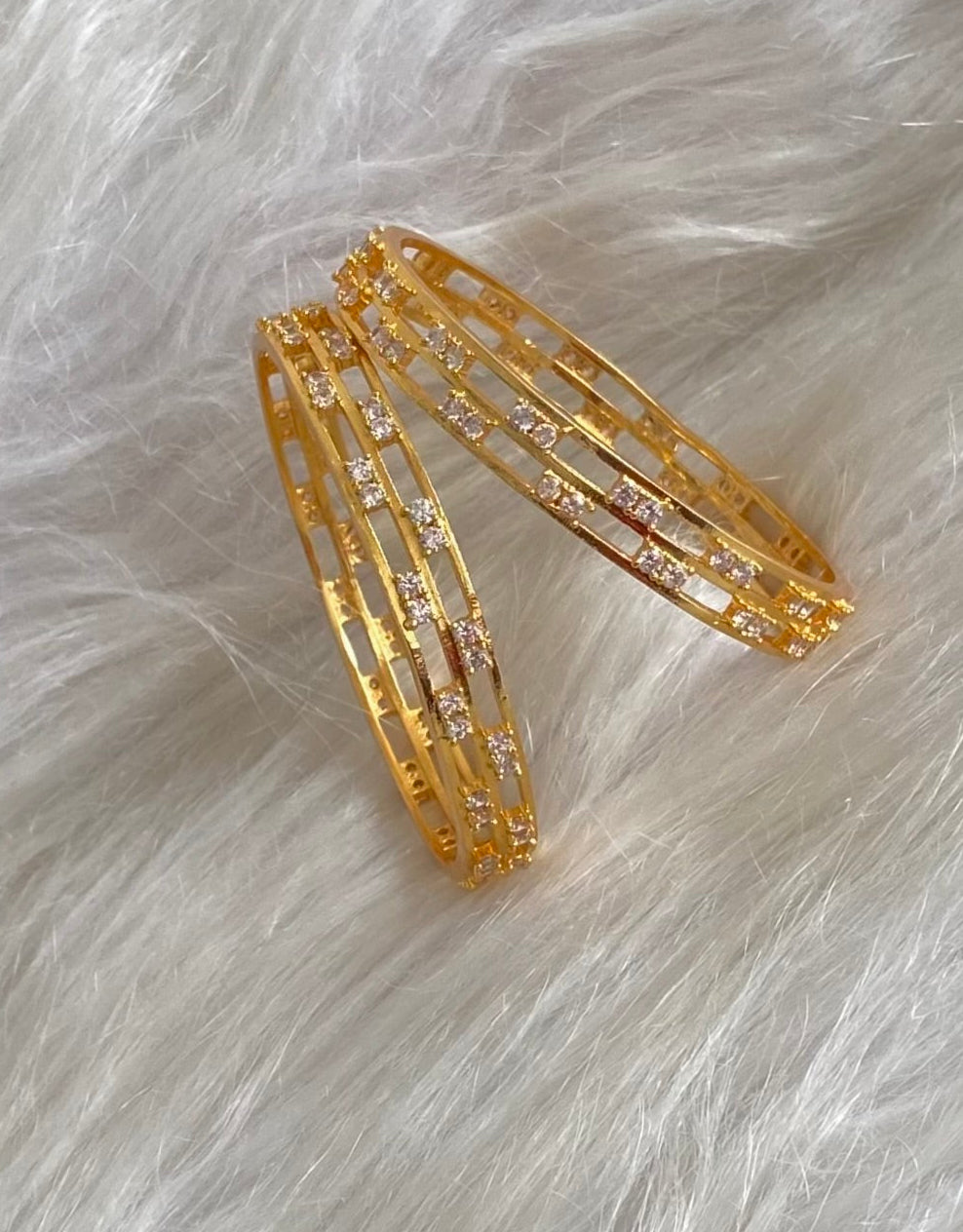 Gold tone white stone bangles(2.4) Dj-54829