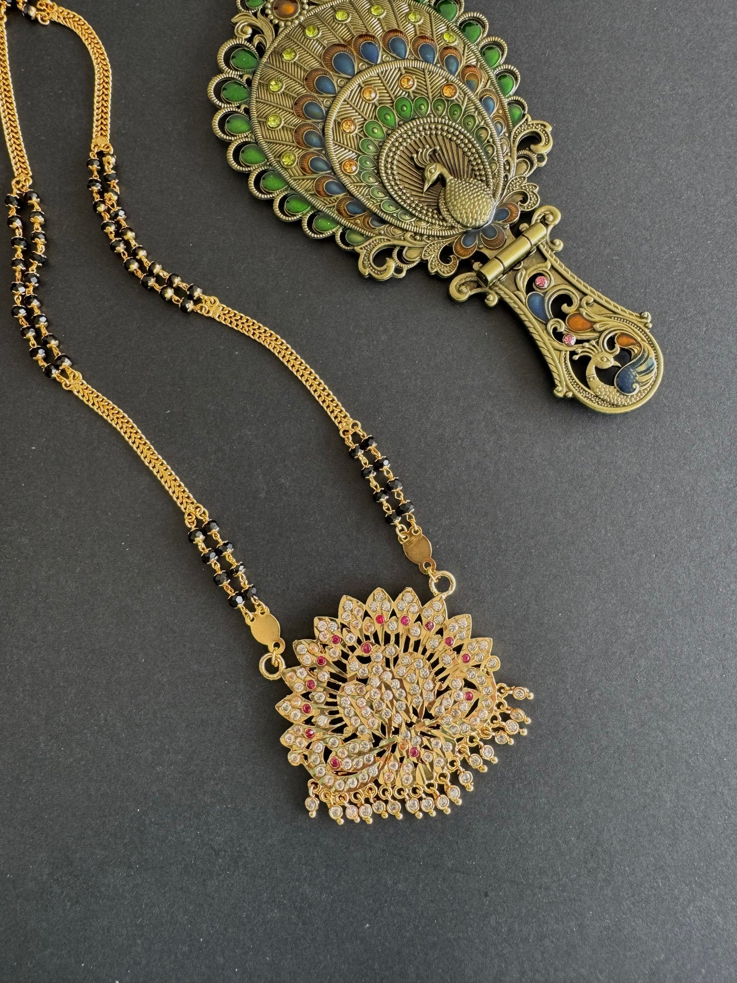 Gold tone 24 inches Karimani chain with AD peacock pendant dj-52228