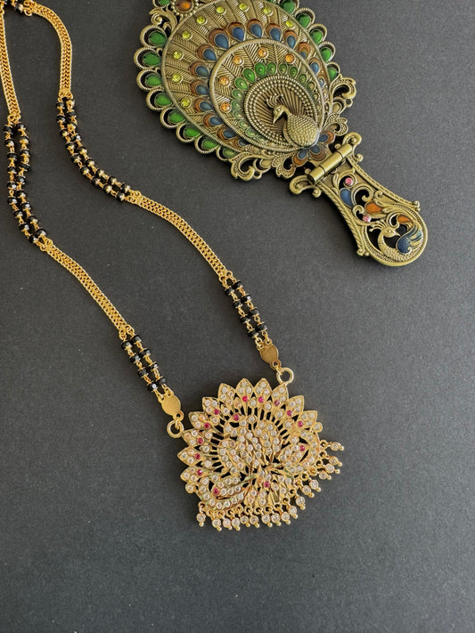 Gold tone 24 inches Karimani chain with AD peacock pendant dj-52228