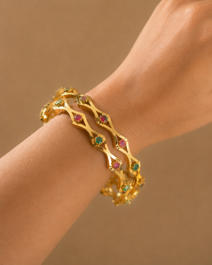 Gold tone ruby-emerald set of 2 bangles (2.6) dj-05529