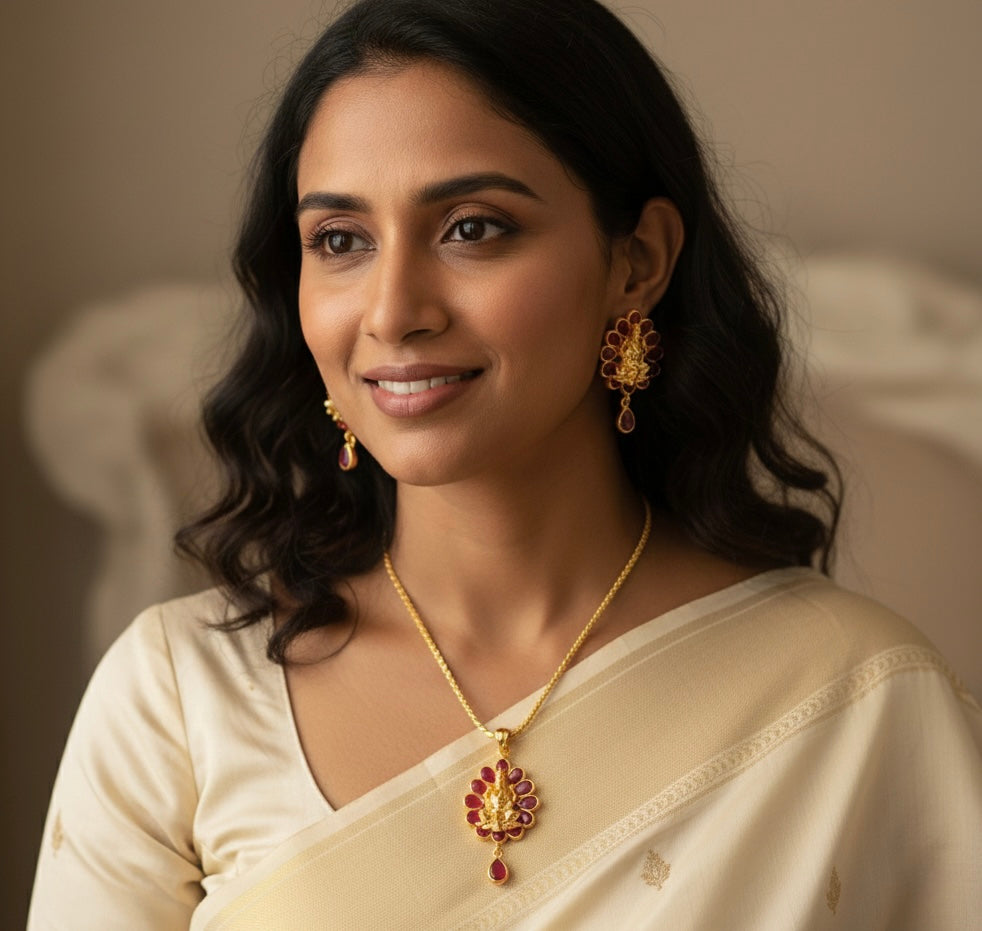 Gold Tone Ruby Lakshmi Pendant set with 18 inches chain DJ18223