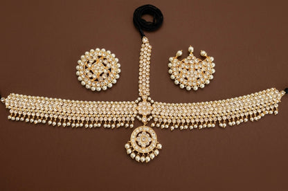 Gold tone AD white stone pearl with sun moon set tikka dj-53385
