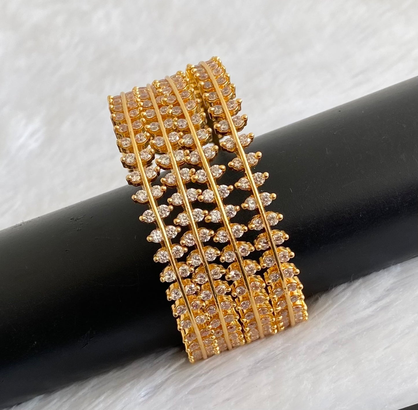 Gold tone white stone set of 4 bangles(2.4) dj-53428