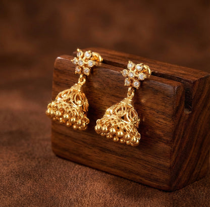 Gold tone ad white south indian flower jhumkka dj-52788